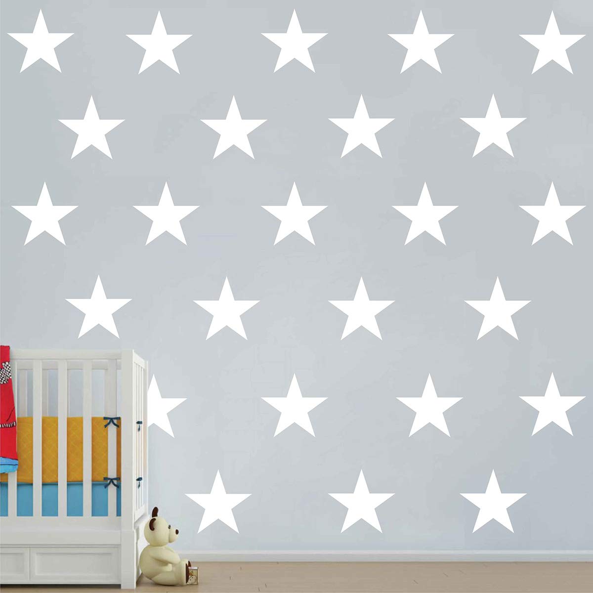 DXLING D399 white star decal close-up for nursery wall décor and playful ambiance.