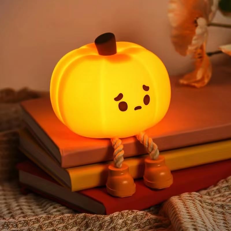 Dylviw Pumpkin Night Light front view glows softly, creating cozy nursery ambience.