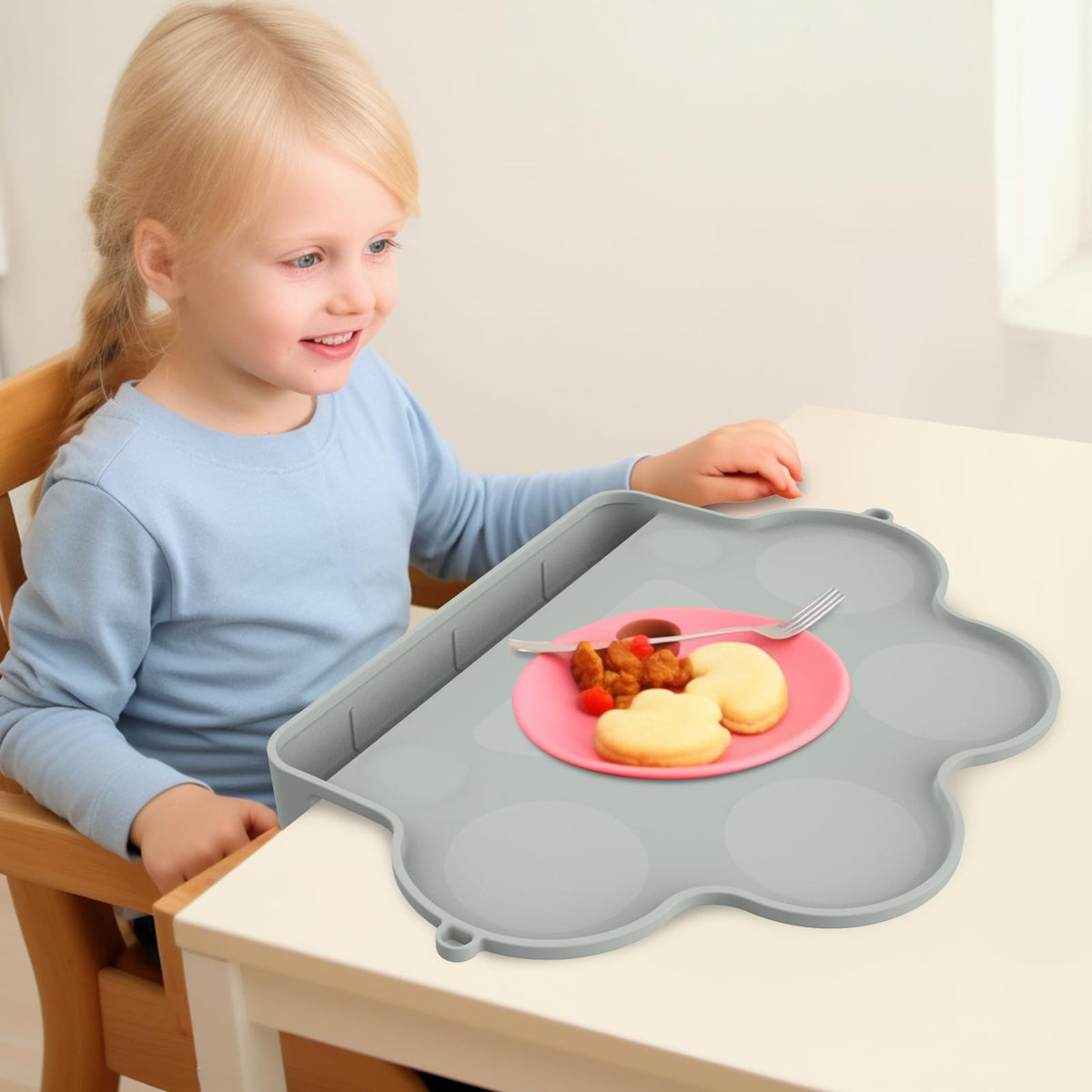 E1F1NN DOT baby silicone placemats on table keep meals stable for toddlers.