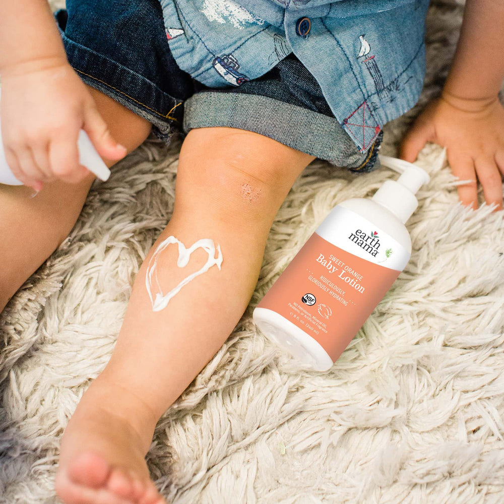 Earth Mama Sweet Orange Baby Lotion NSF-certified label signals trusted organic ingredients.