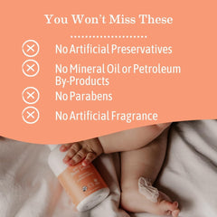 Earth Mama Sweet Orange Baby Lotion texture closeup shows creamy, silky application.
