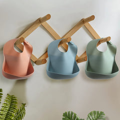 Eascrozn waterproof bibs roll up compactly for travel and storage.
