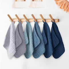 Ease Cubs absorbent washcloths in action during diaper changes.