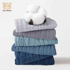 Ease Cubs muslin texture close-up shows ultra-soft cotton for sensitive skin.