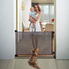 EasyBaby retractable gate fully-extended up to 55 inches covers a wide doorway.