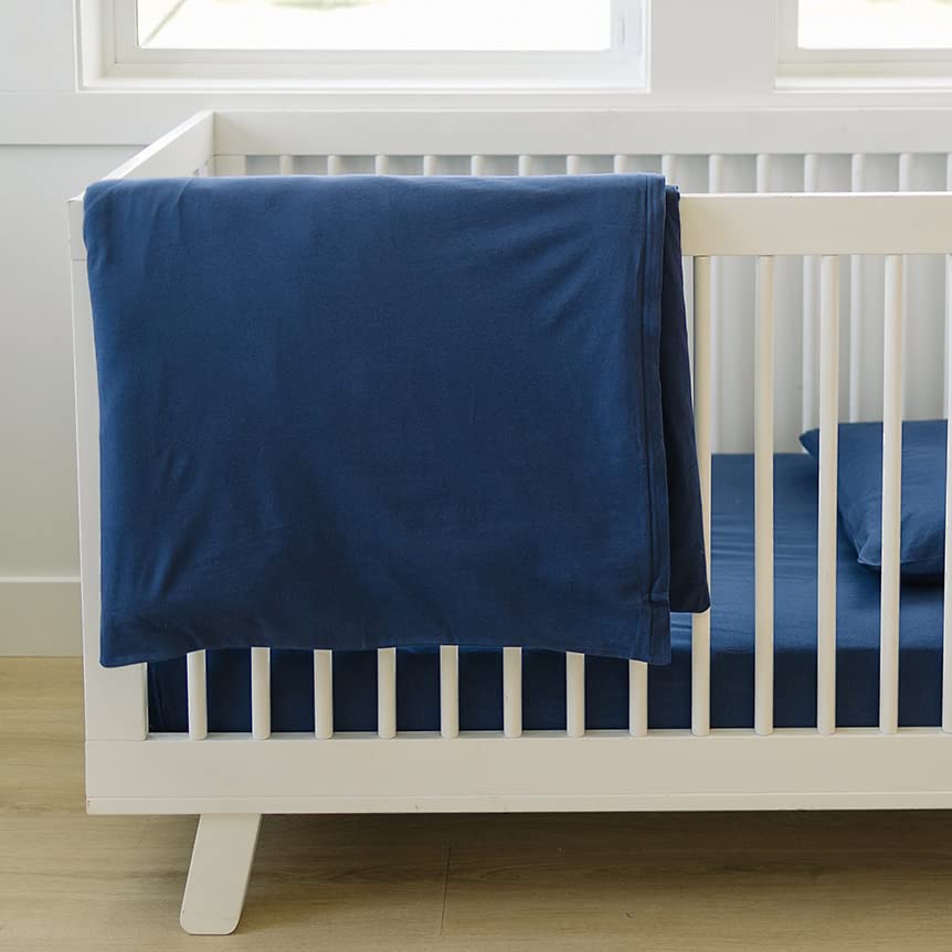 Ecolino duvet cover navy blue in a nursery scene highlighting cozy breathable fabric.