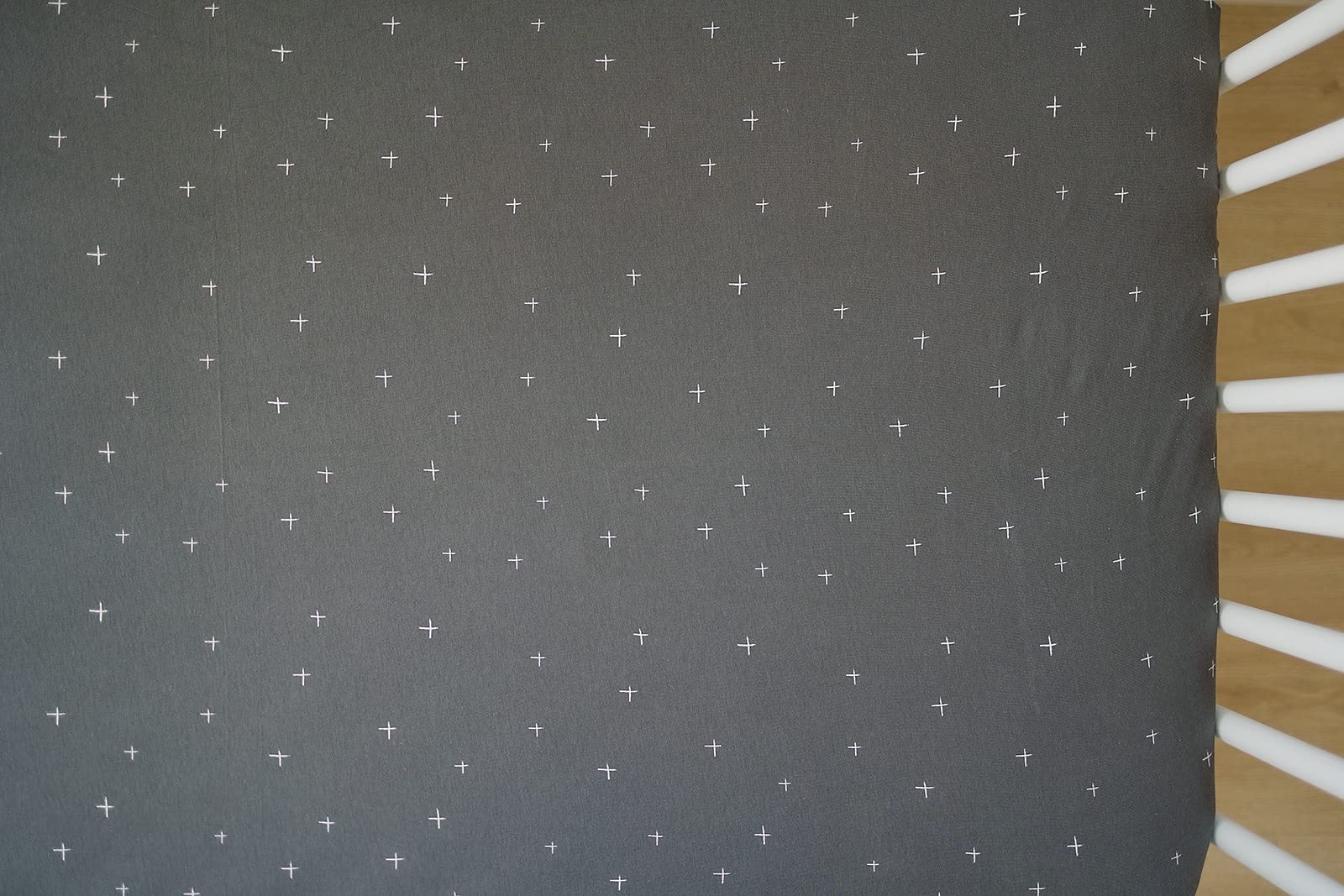 Ecolino slate twinkle dots design complements Boho, modern, or classic nurseries.