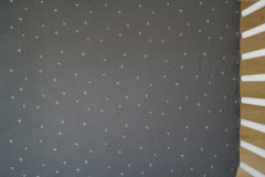 Ecolino slate twinkle dots design complements Boho, modern, or classic nurseries.