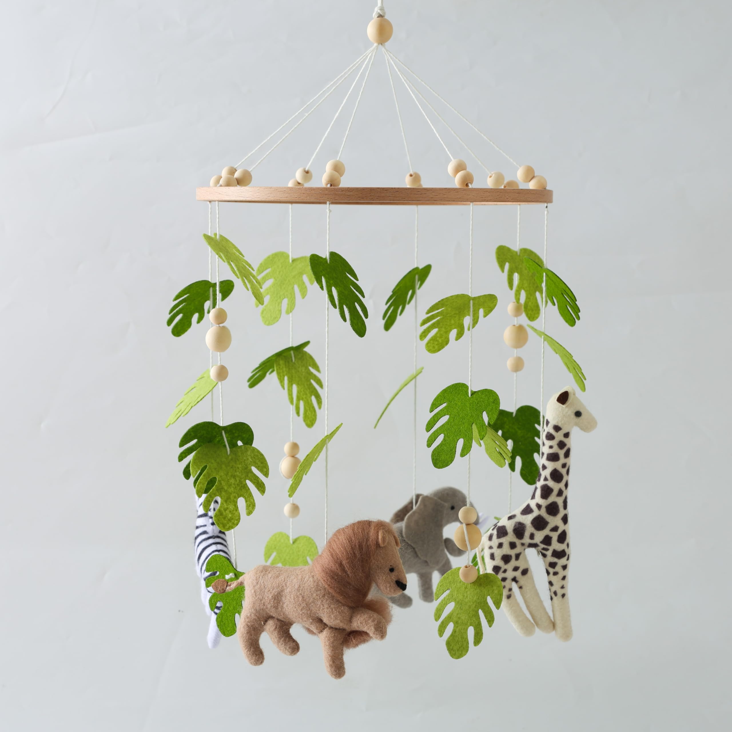 EERKEOD baby crib mobile with forest animals offers gentle visual stimulation for infants.