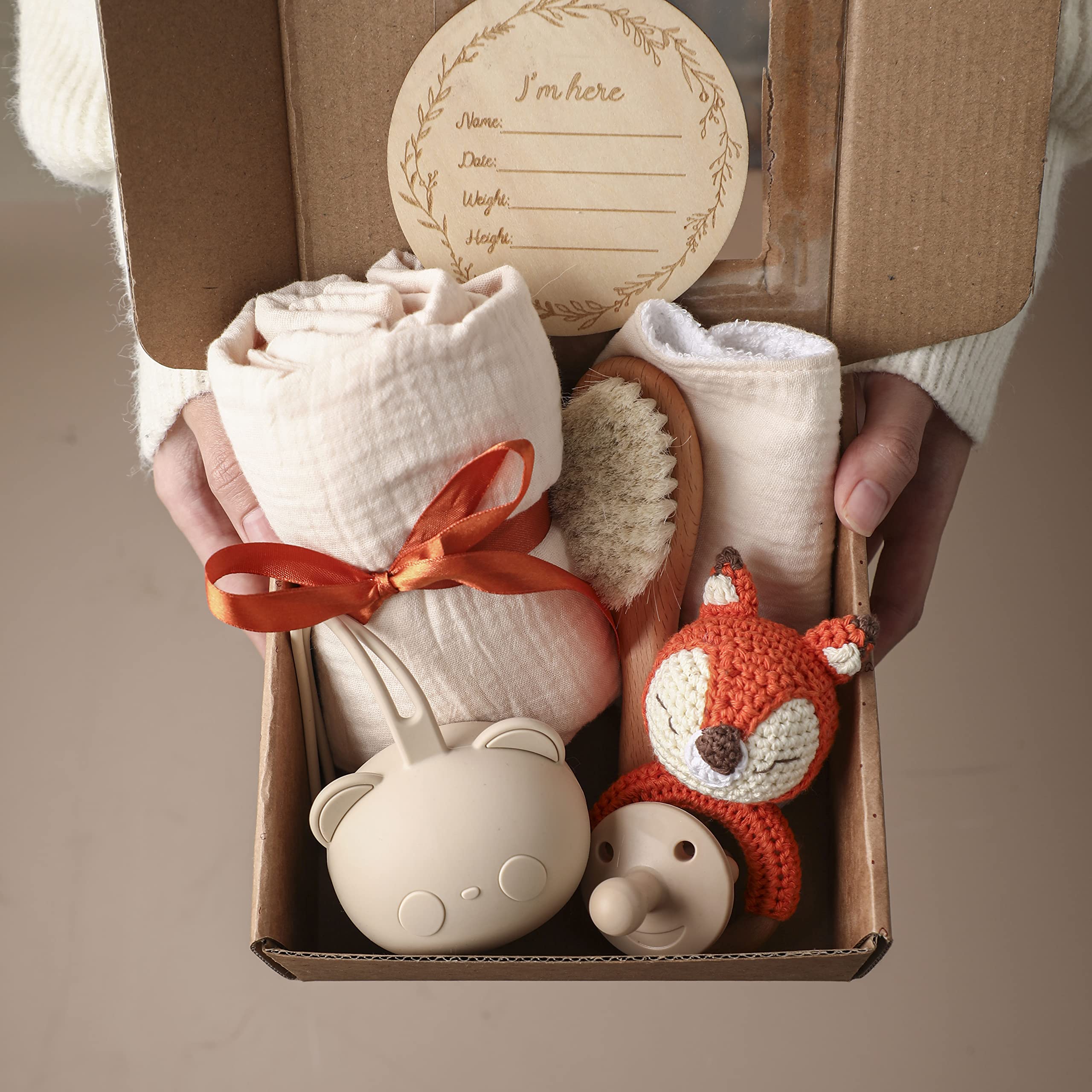 EERKEOD wooden knitted rattle offers tactile play and exploration.