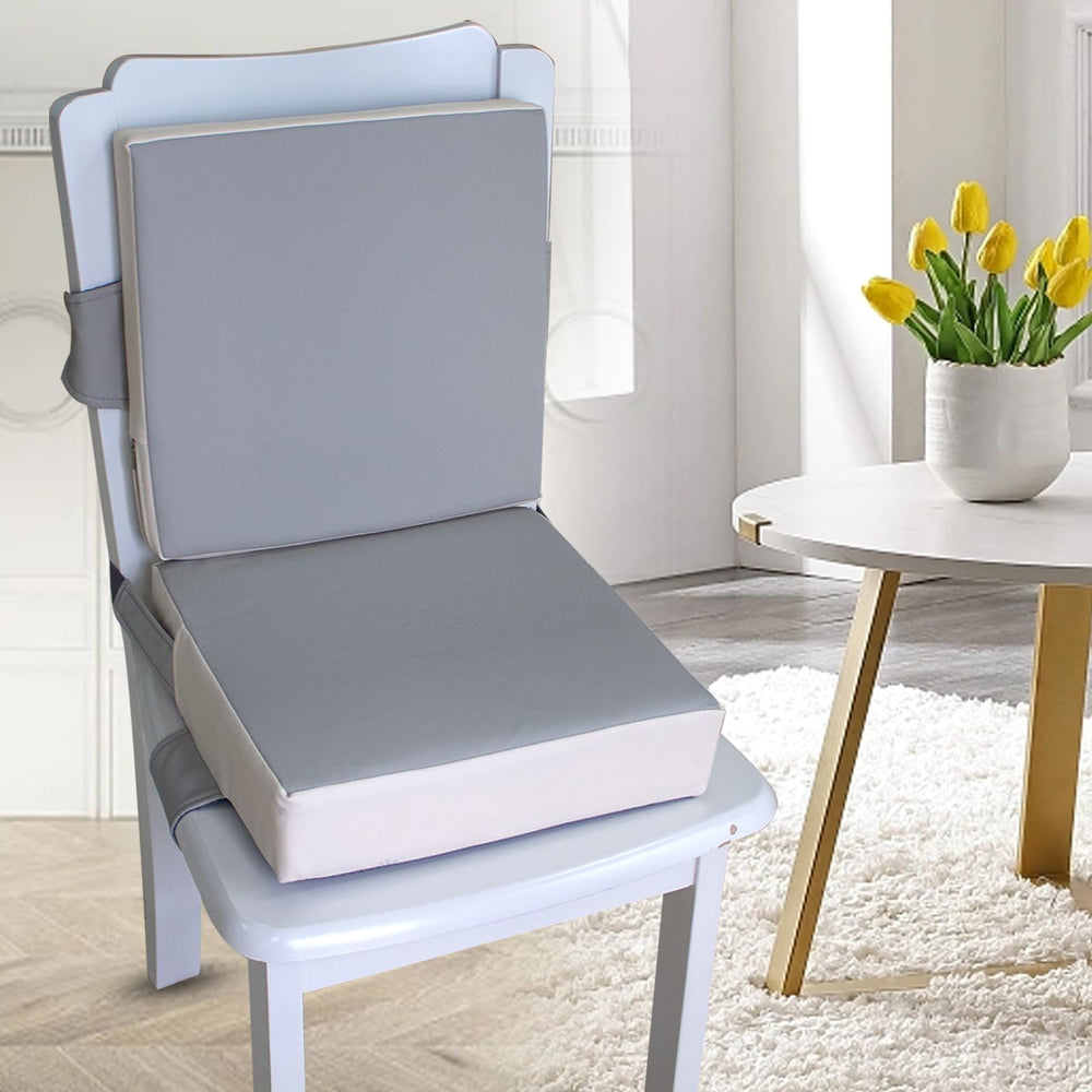 Eiury booster seat easy-clean closeup demonstrates quick cleanup with a damp wipe.