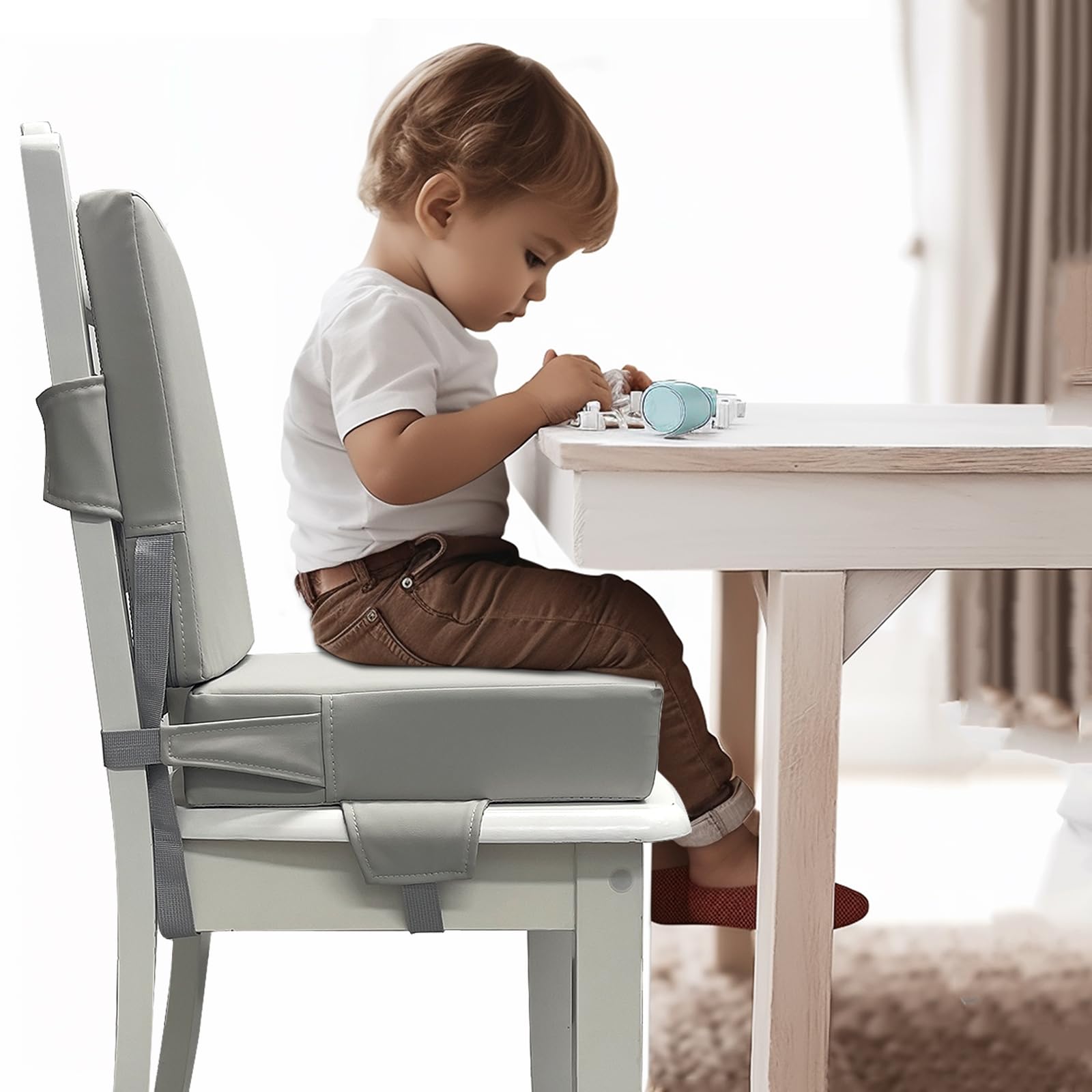 Eiury booster seat surface closeup highlighting easy clean waterproof PU leather