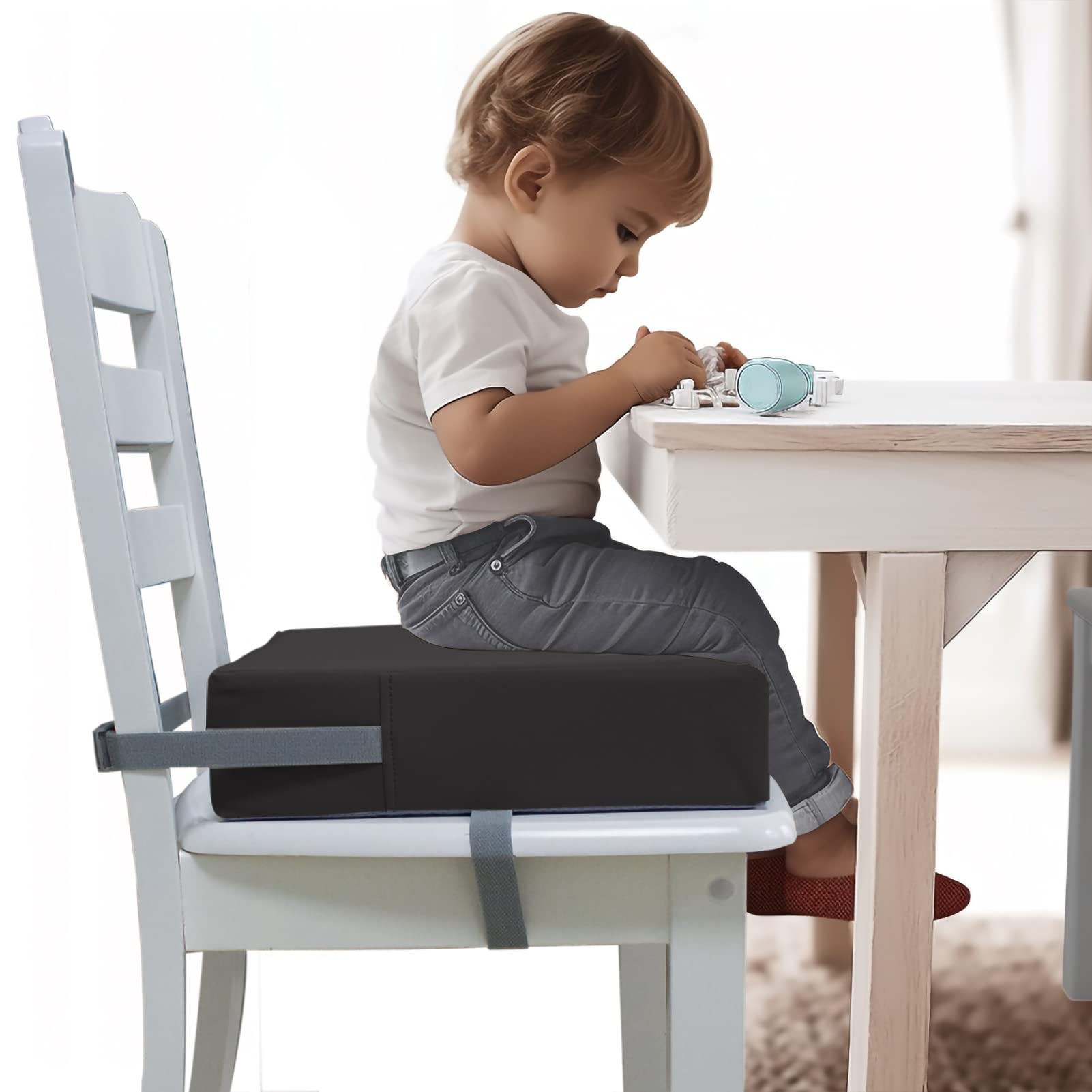 Eiury toddler booster seat assembly demonstrates quick setup on most chairs.