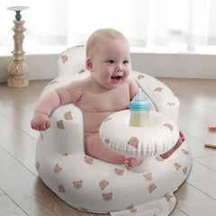 EKEPE baby seat built-in tray keeps a bottle within reach during snacks.