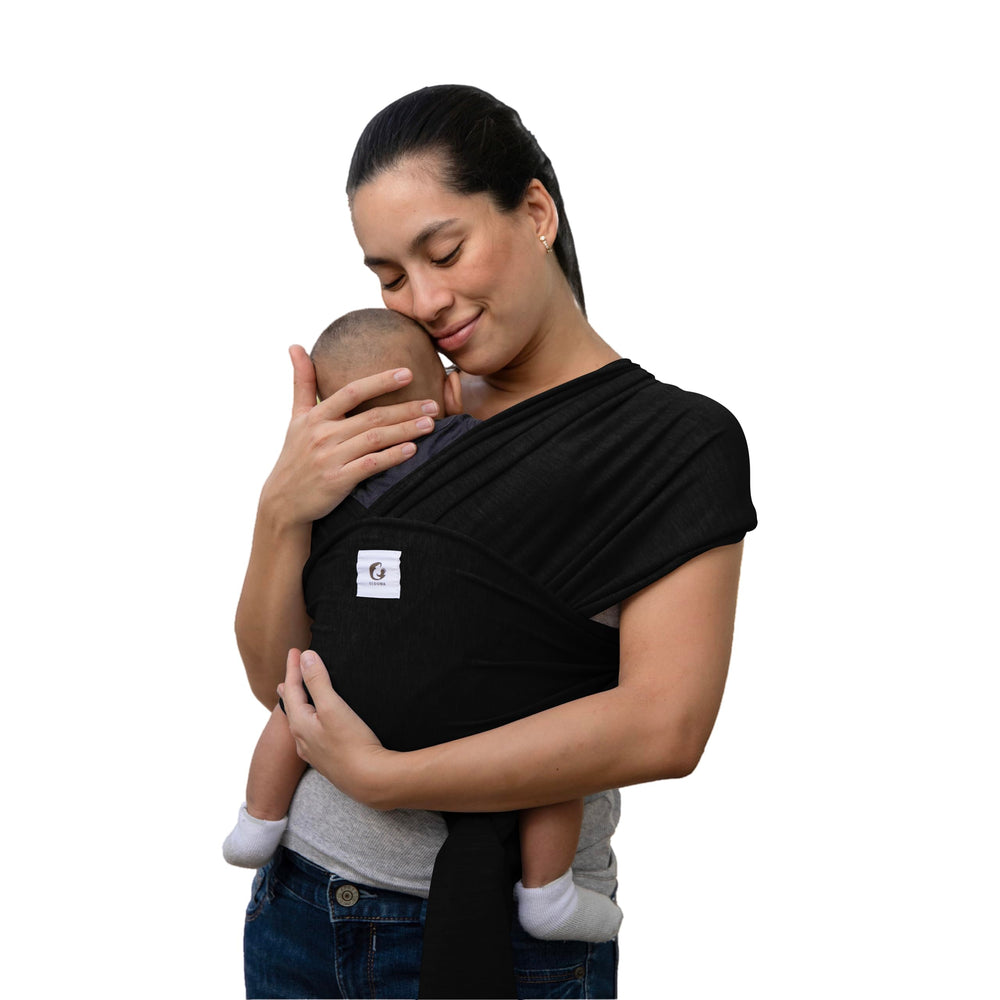 ELDOMA Black Baby Wrap Carrier in-use for hands-free bonding and soothing closeness.