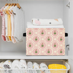 Elefeltclave Pink Bow bin in a girl’s bedroom for toy and clothing storage.