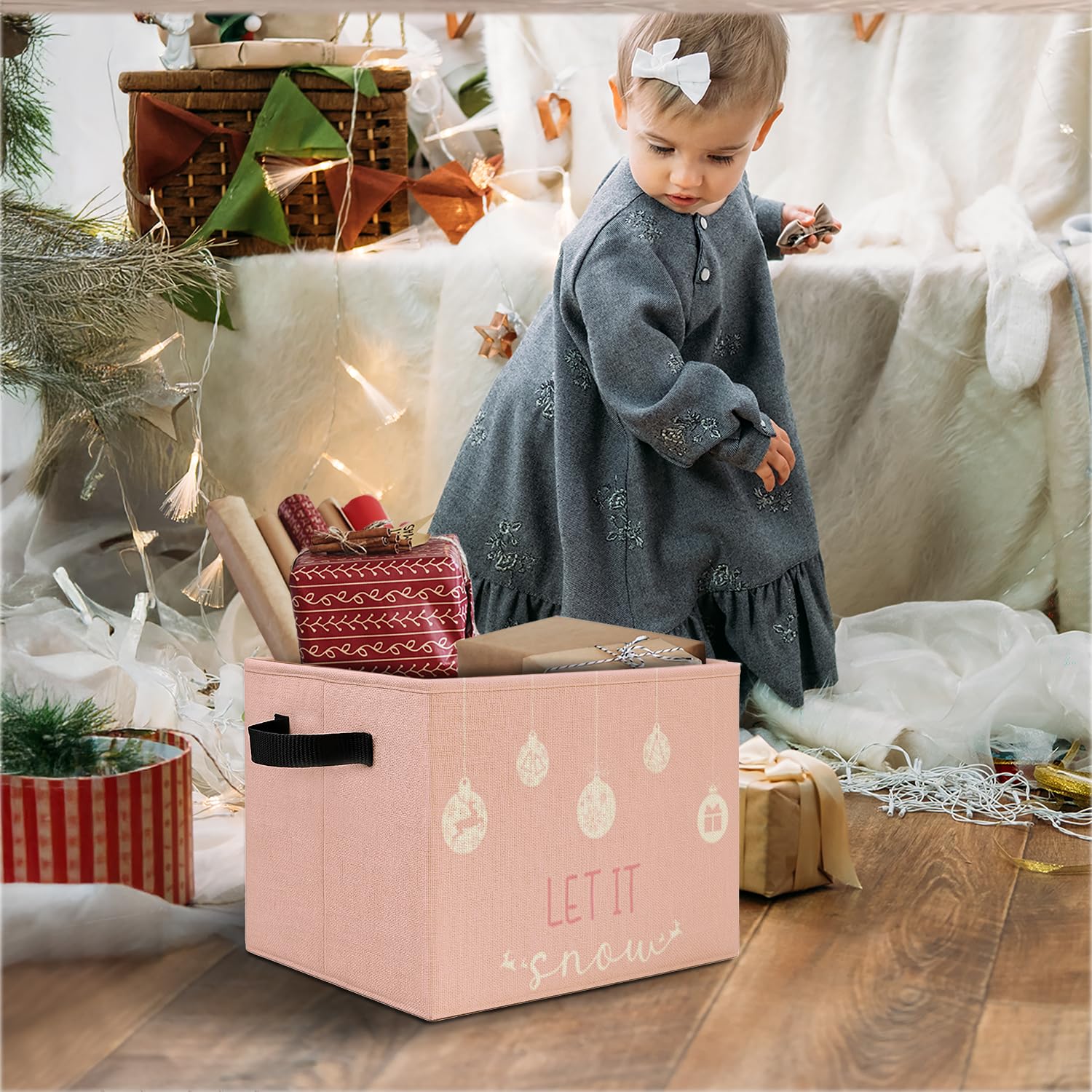 Elefeltclave pink Christmas storage bin in use in a bedroom offers tidy organization.