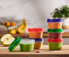 Elegant Disposables baby food container with green lid for on-the-go feeding organization.