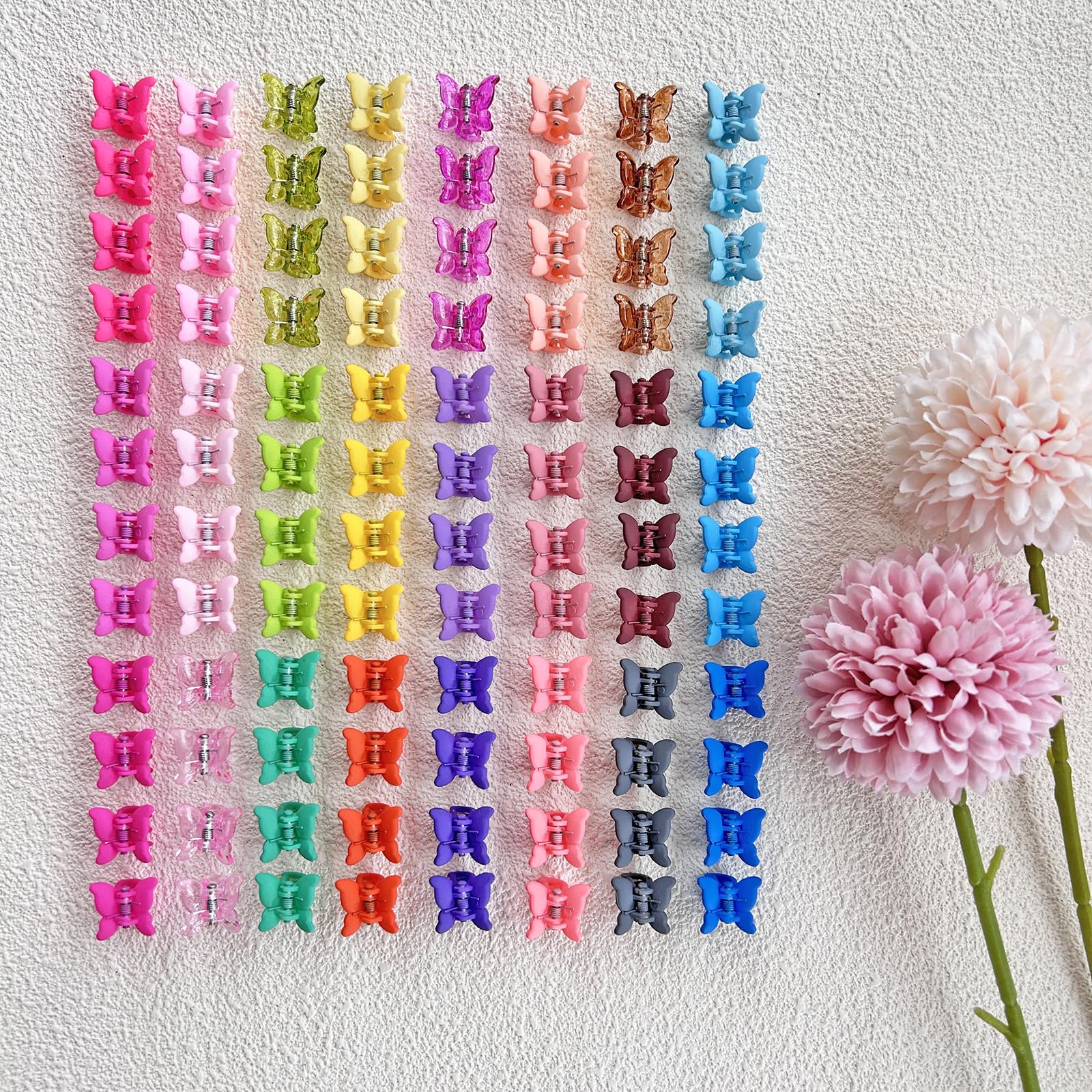 Elemirsa butterfly-shaped clips adding cute detail to toddler hairstyles.