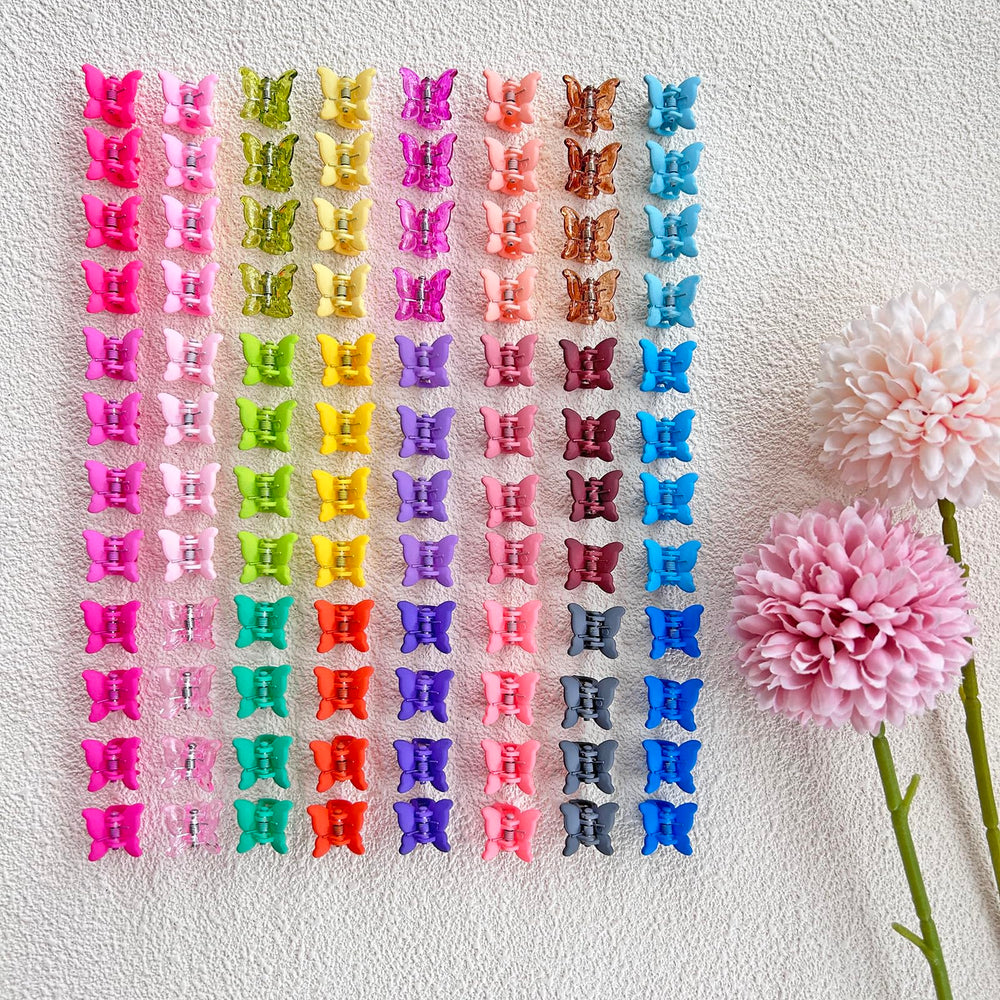 Elemirsa butterfly-shaped clips adding cute detail to toddler hairstyles.