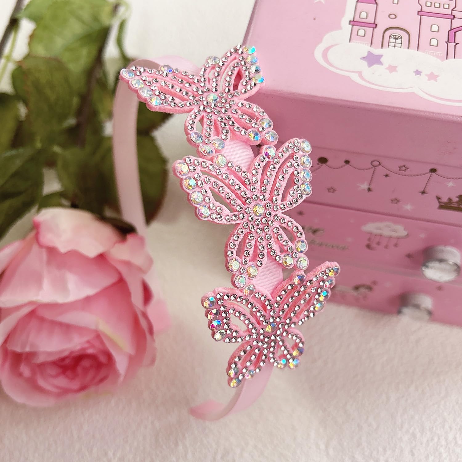 Elemirsa butterfly hoops worn by a child for comfortable all-day wear.
