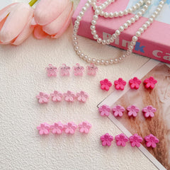 EleMirsa flower clips in organizer box showcased for versatile color outfits.