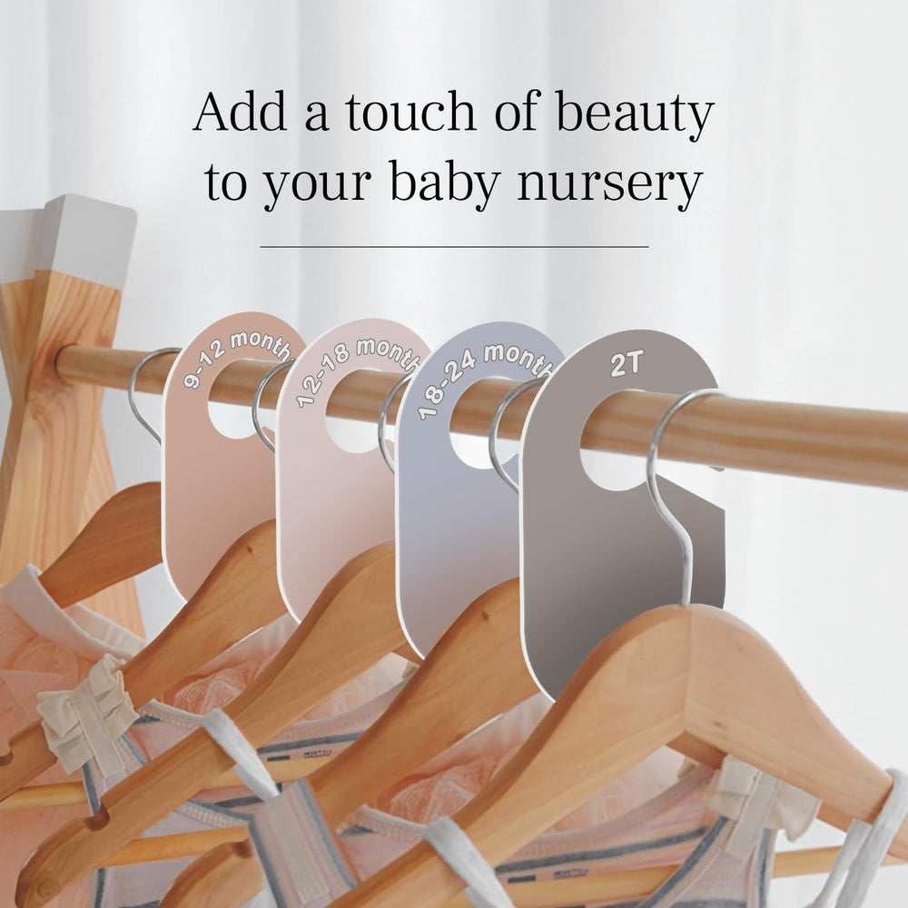 Eli with Love neutral nursery display with organized wardrobe segments