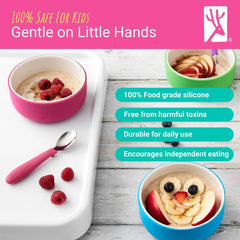 Elk and Friends kids porcelain bowls with silicone sleeve grip close-up showing slip-free design.