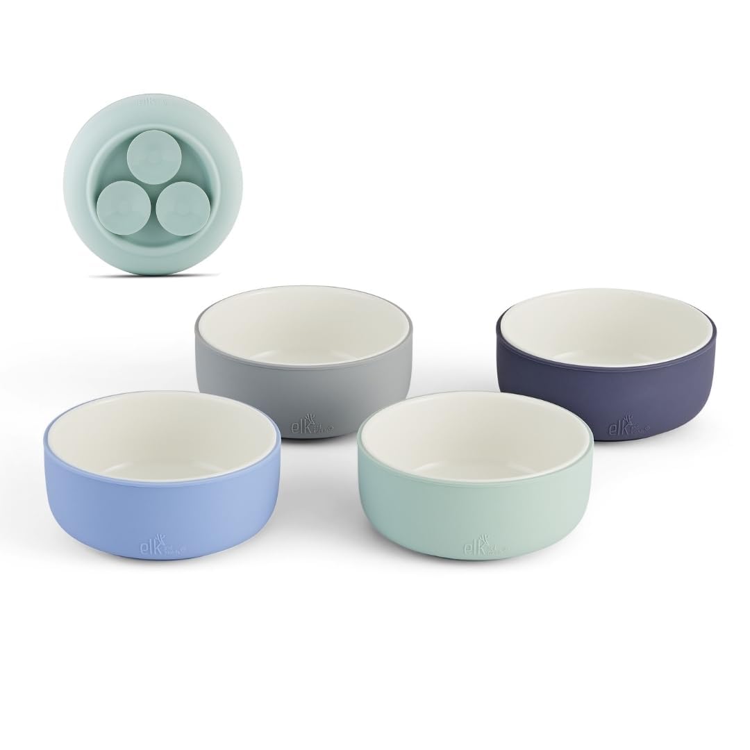 Elk and Friends bowls with suction sleeve set up for mess-free toddler meals.