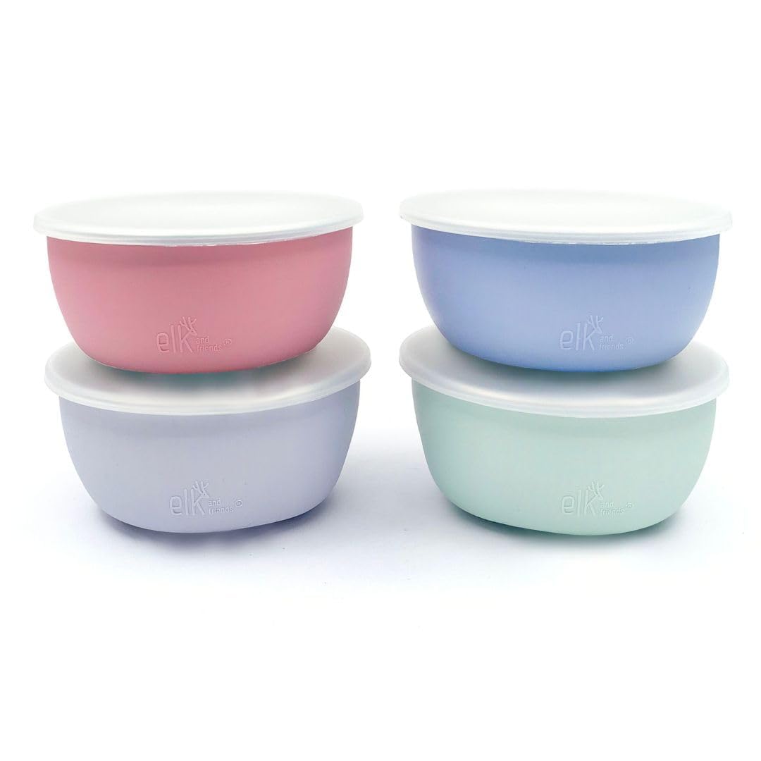 Elk and Friends stainless steel bowls with silicone sleeve show non-slip grip for self-feeding.