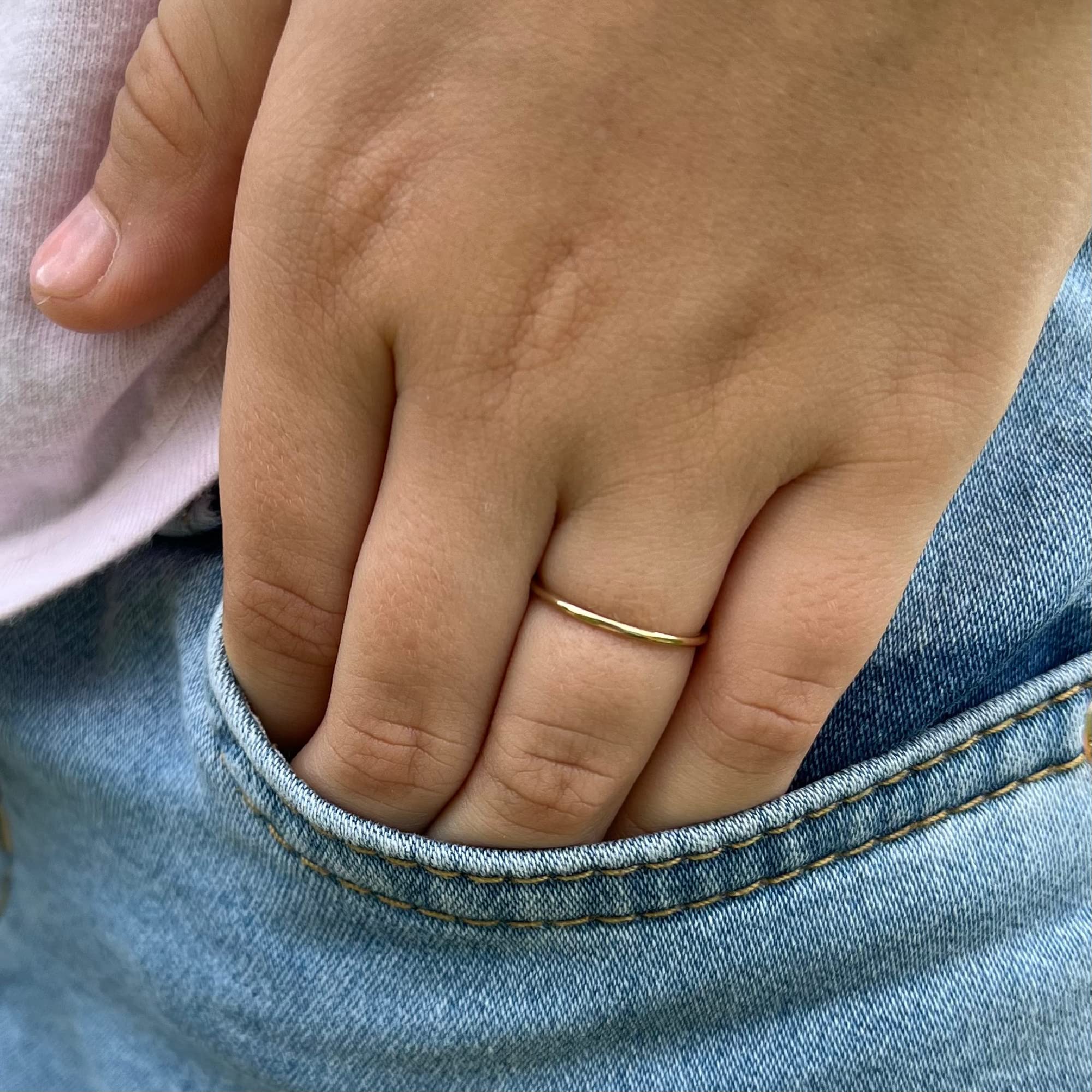 Ellie J Maui baby stacking rings on tiny hand ideal for daily wear