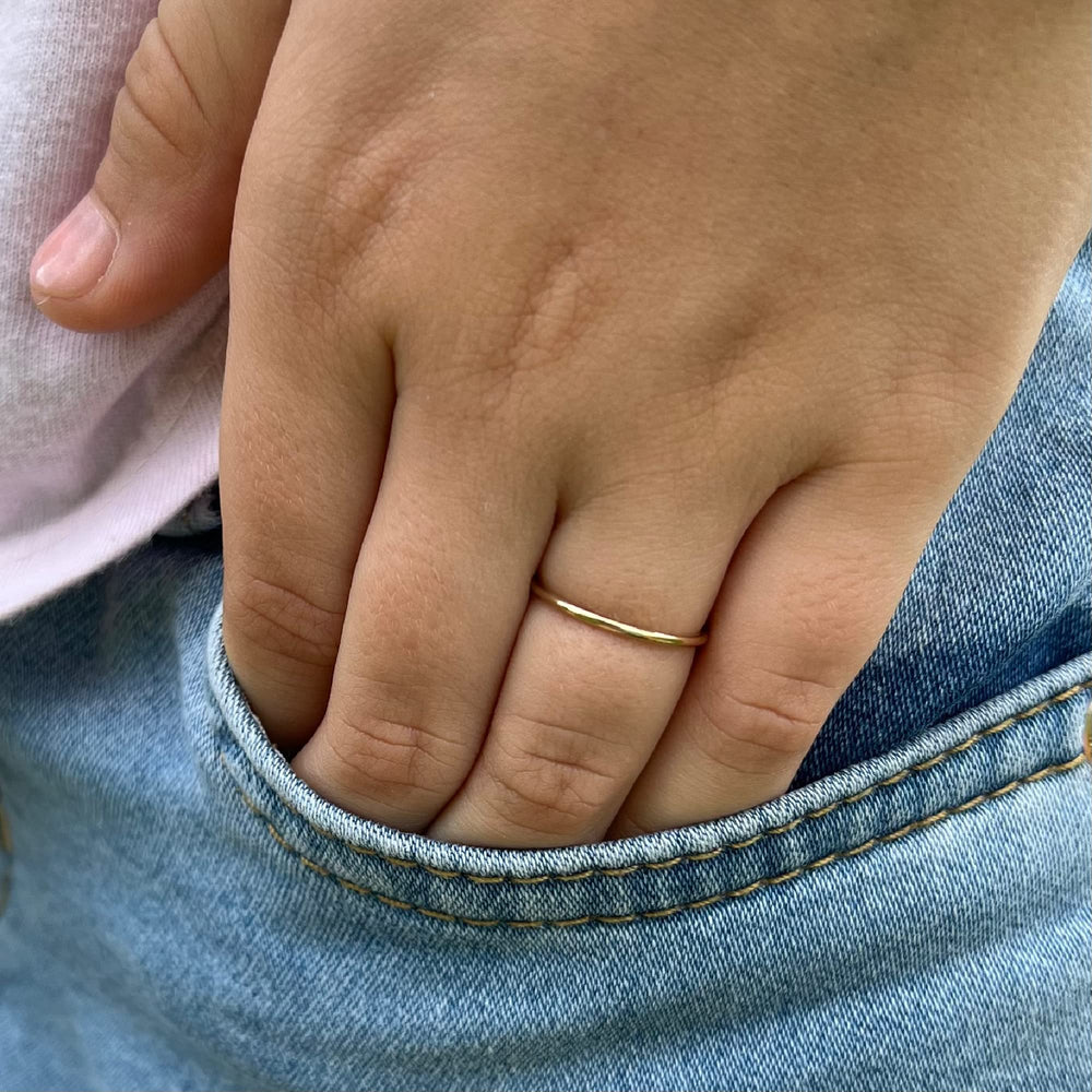 Ellie J Maui baby stacking rings on tiny hand ideal for daily wear