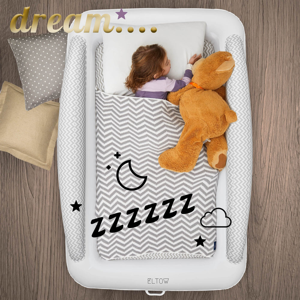 ELTOW gray chevron design adds style to portable toddler sleep setups.