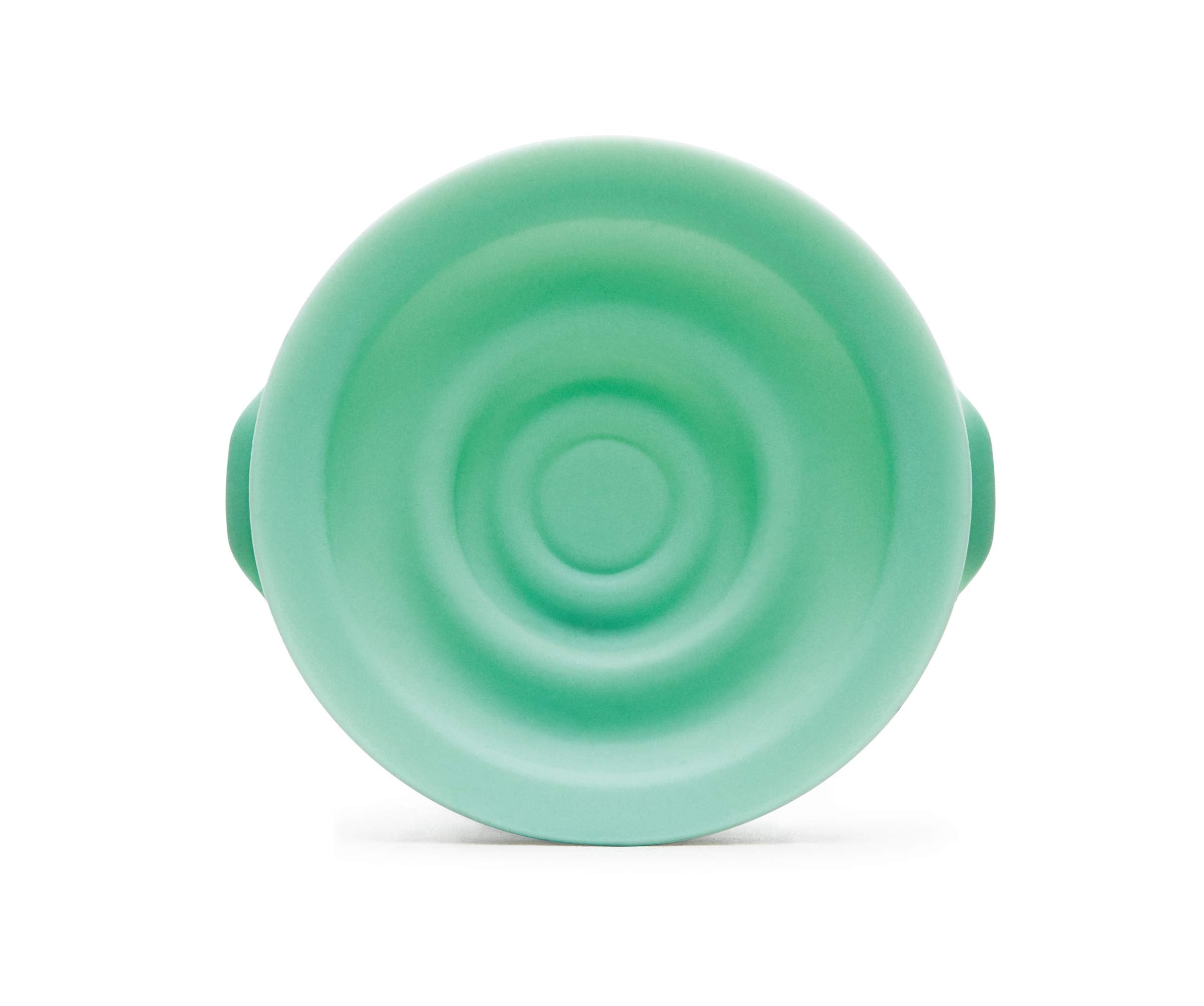 Elvie breast pump seals close-up showing silicone seal for hygienic closed system.
