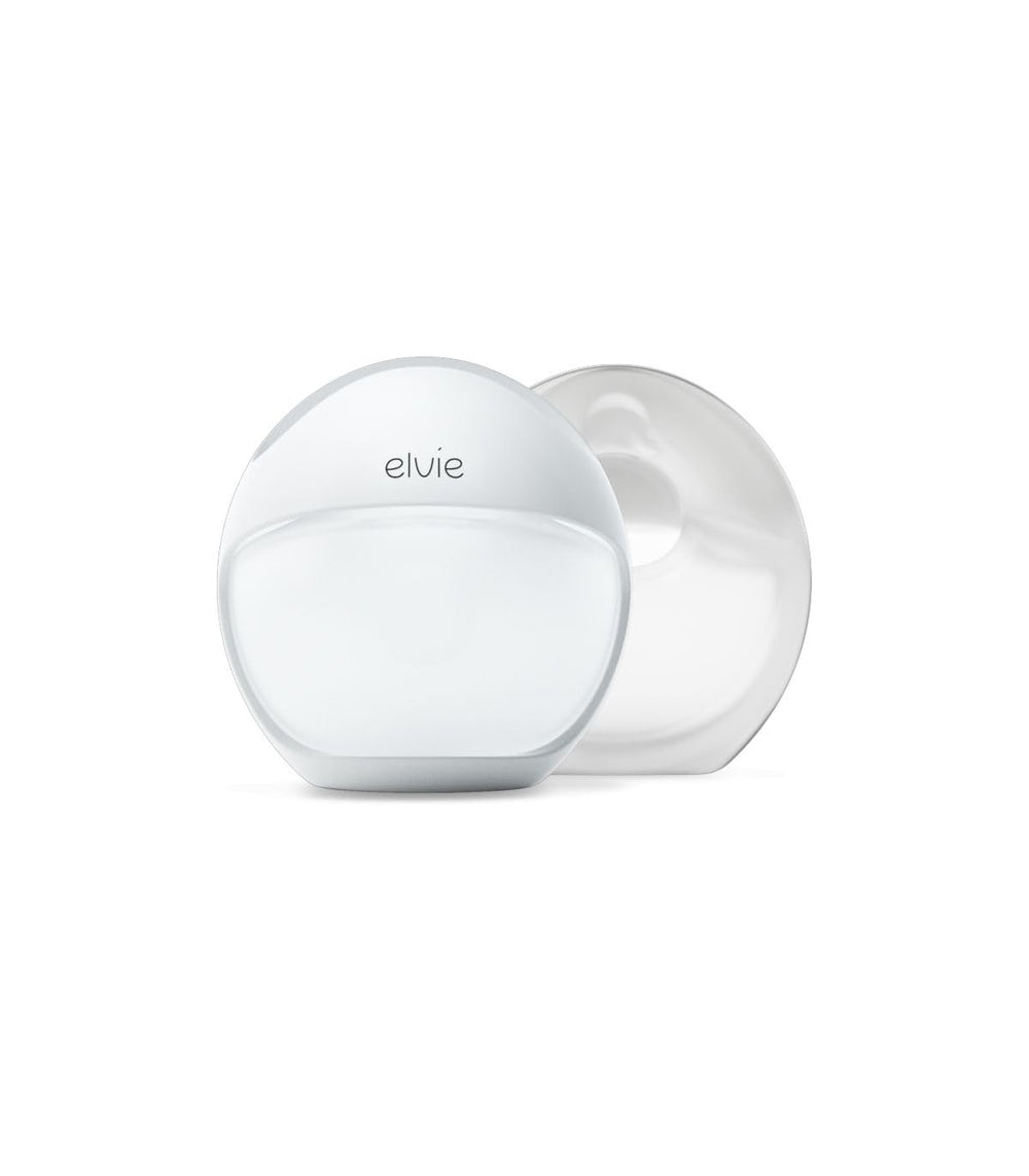 Elvie Curve wearable breast pump tucked in the bra for discreet hands-free milk expression.