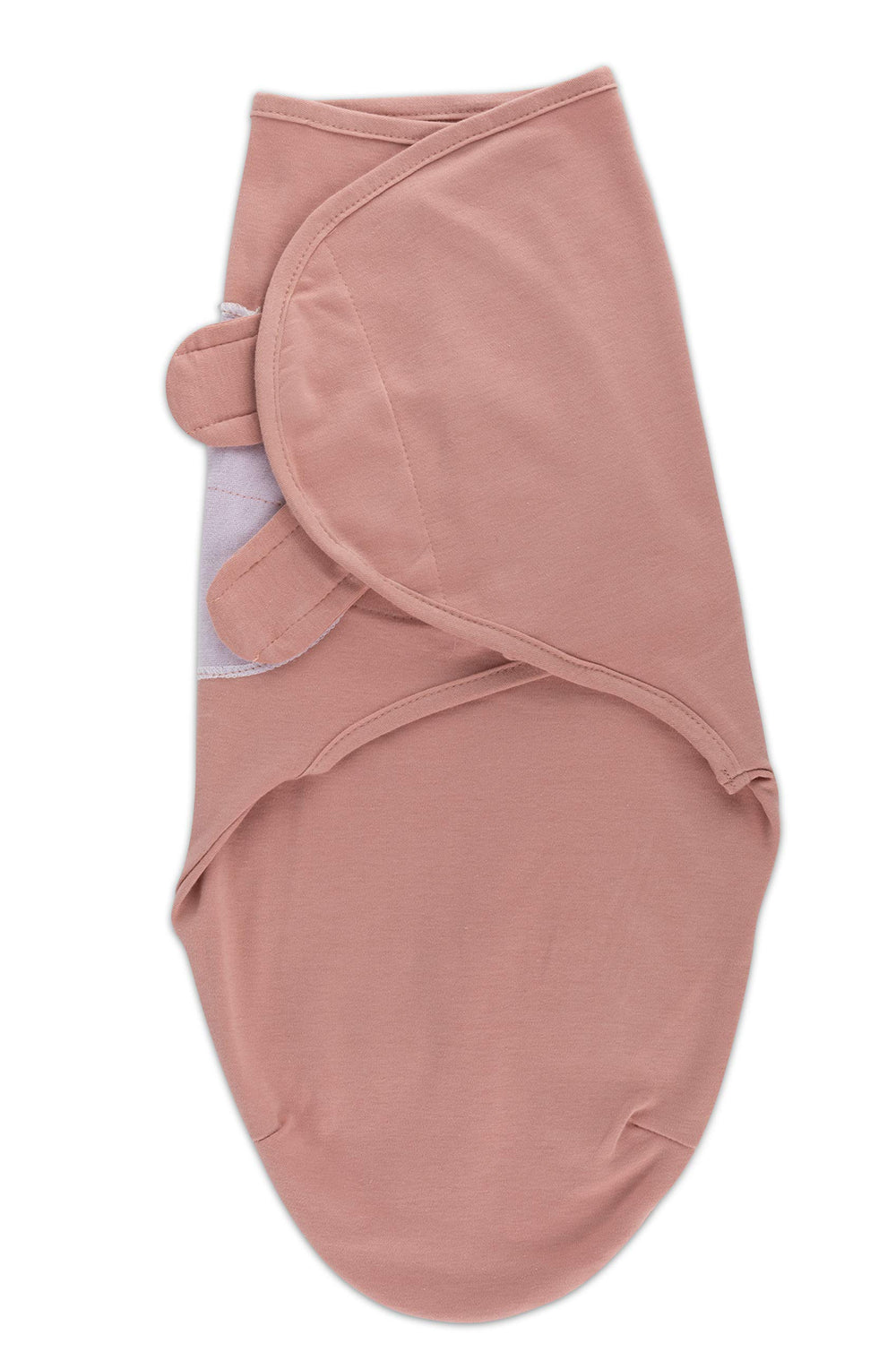 Ely's & Co newborn swaddle on a baby during nap emphasizes cozy security