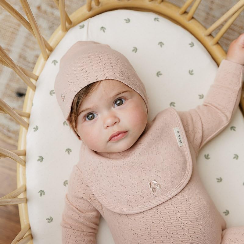 Gift-ready packaging showcases Ely's & Co bassinet sheets as a thoughtful baby shower gift