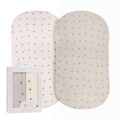 Ely's & Co bassinet sheets two-pack unboxed, showing soft jersey knit fabric gentle on baby's skin