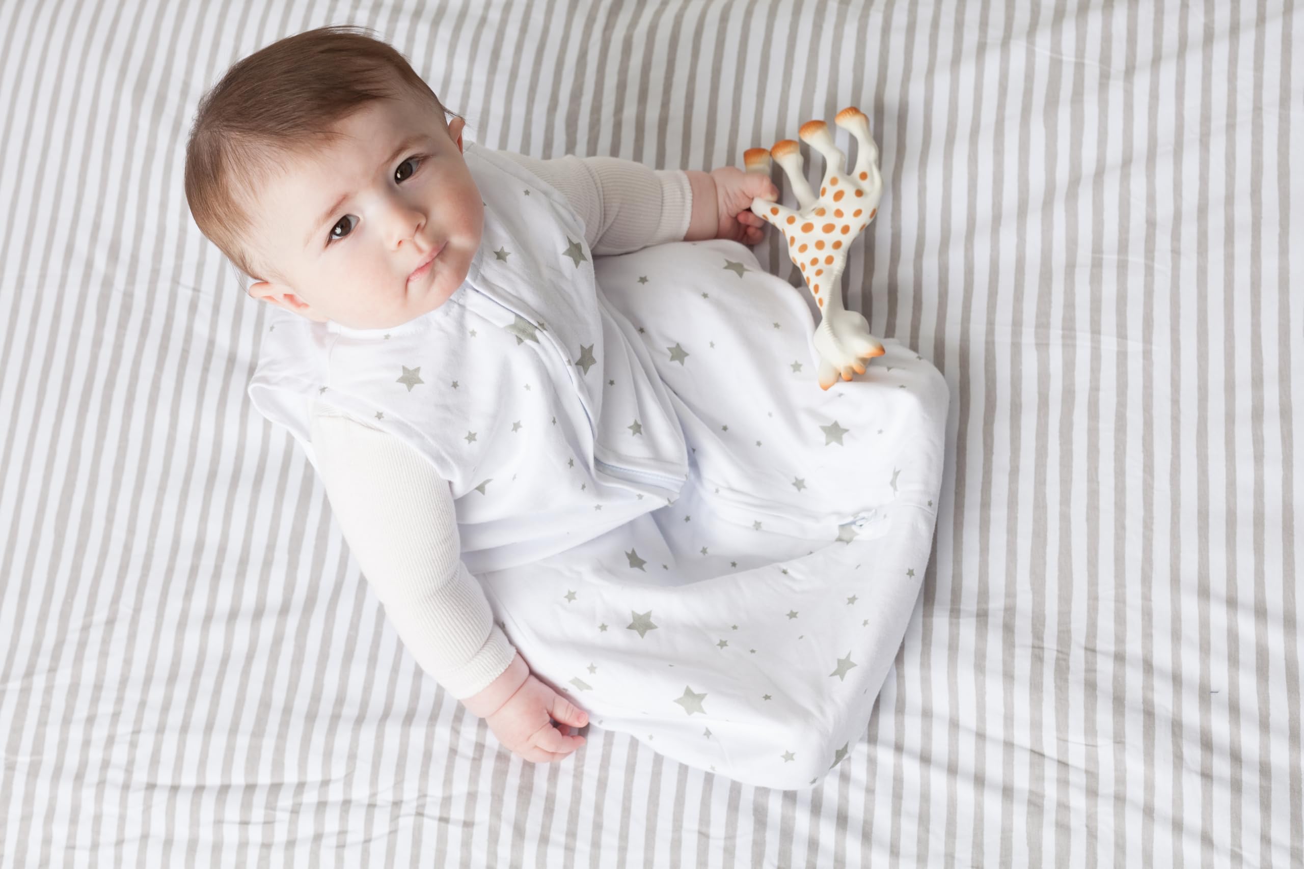 Ely's & Co breathable fabric sleep sack in use, baby safely layered in cozy cotton.