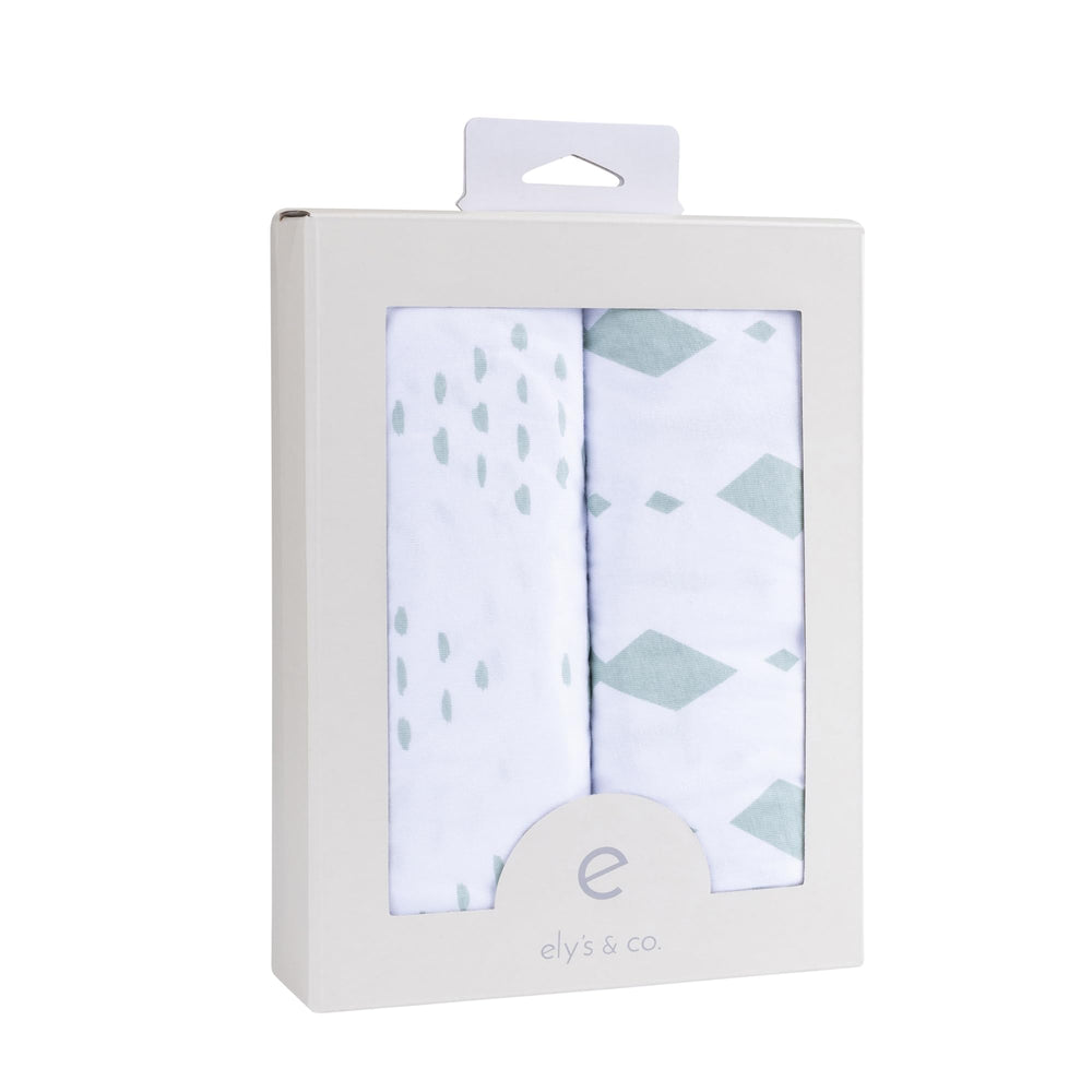 Ely's & Co Changing Pad Cover gray leaf design complements modern nursery decor
