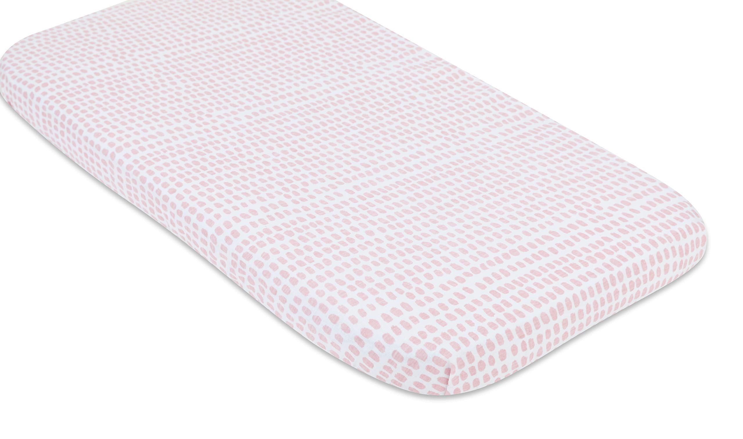 Machine-washable bassinet sheet image communicates easy cleanup after spills