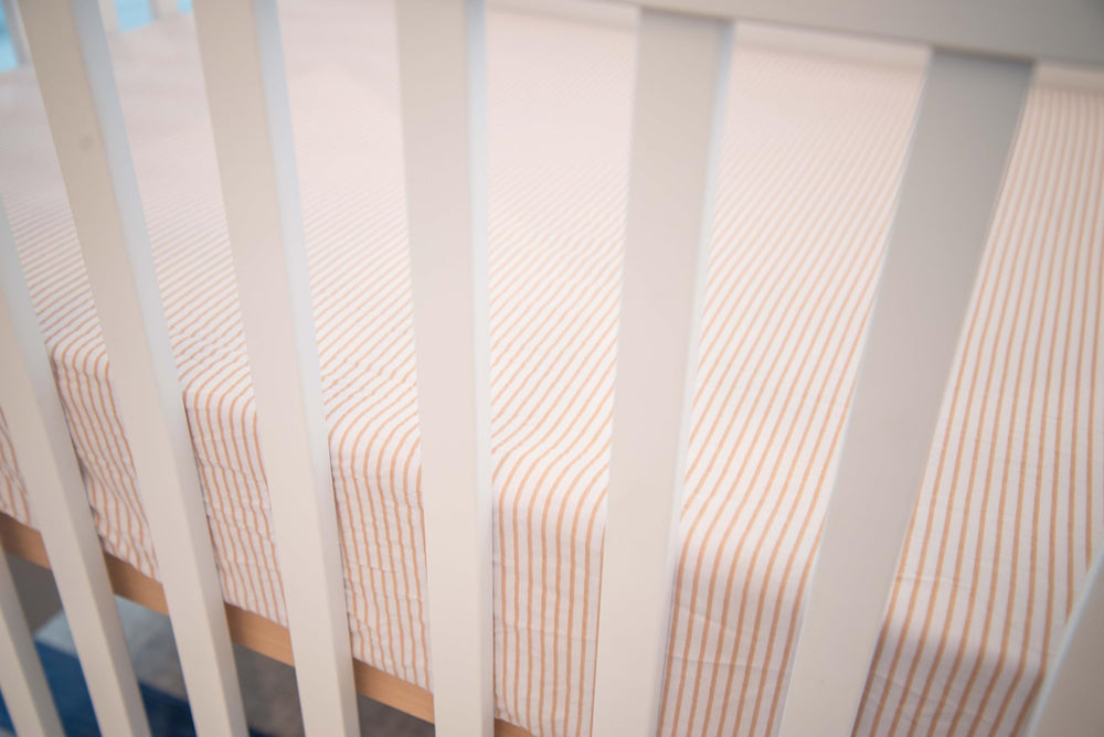 Ely's & Co. care-ready sheets demonstrate machine wash and dryer safety.