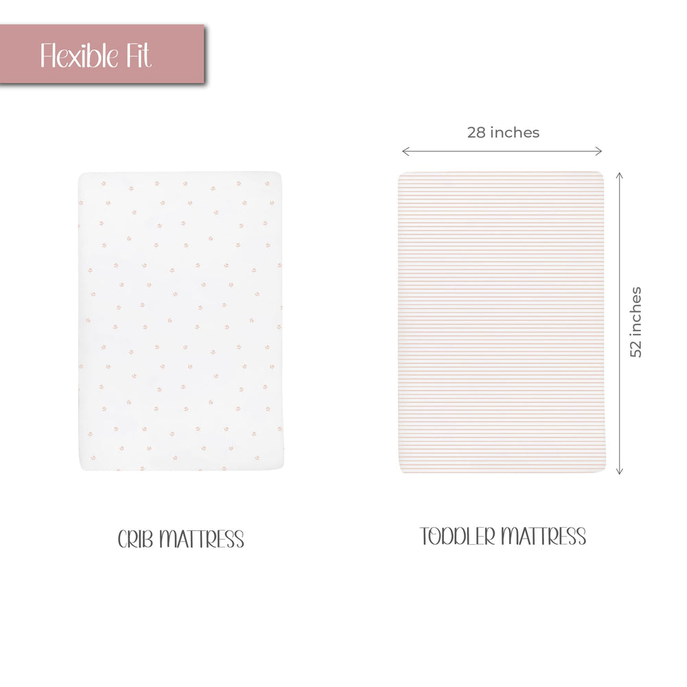 Ely's & Co. pink tulip nursery setup shows soft, feminine bedding for cozy nights.