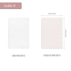 Ely's & Co. pink tulip nursery setup shows soft, feminine bedding for cozy nights.