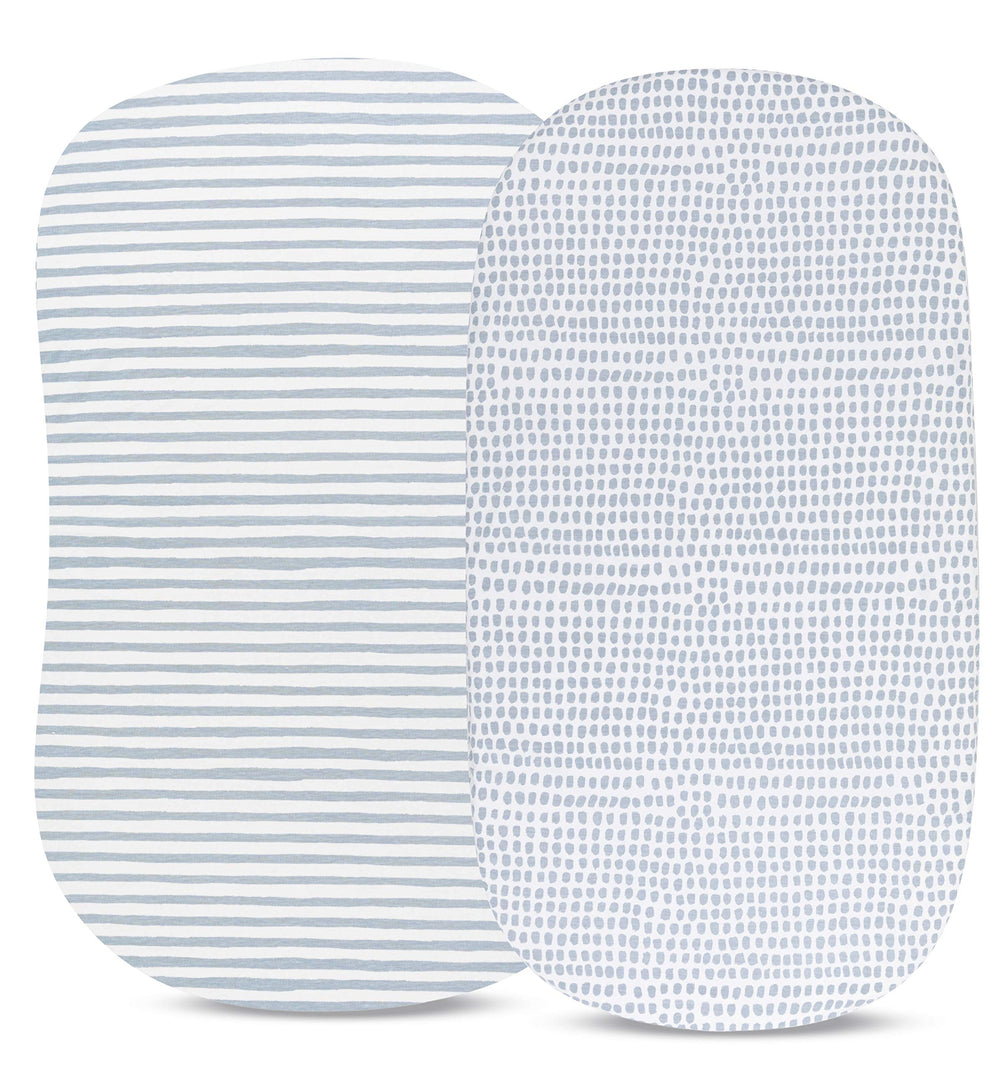 Elastic band on Ely's & Co sheet demonstrates secure, snug-fit for bassinet surfaces.
