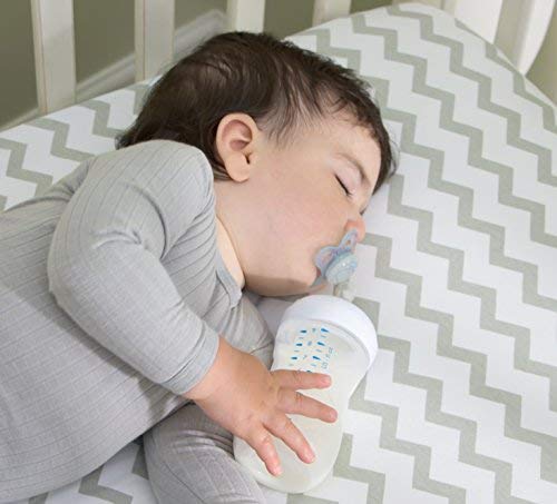 Ely's & Co machine-washable crib sheet ready for quick cleanup.