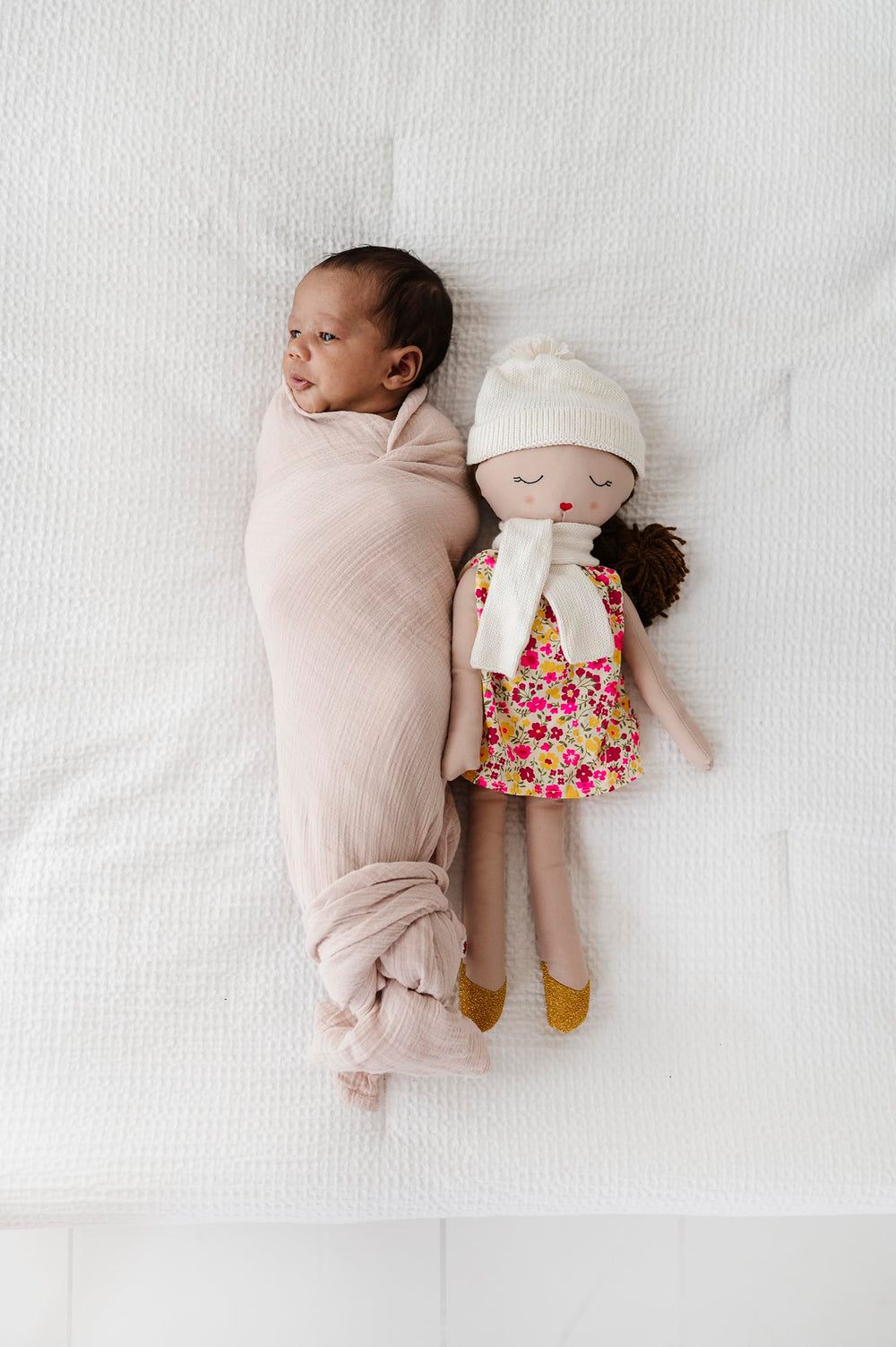 Ely's & Co. muslin swaddle care instructions—machine washable for everyday use