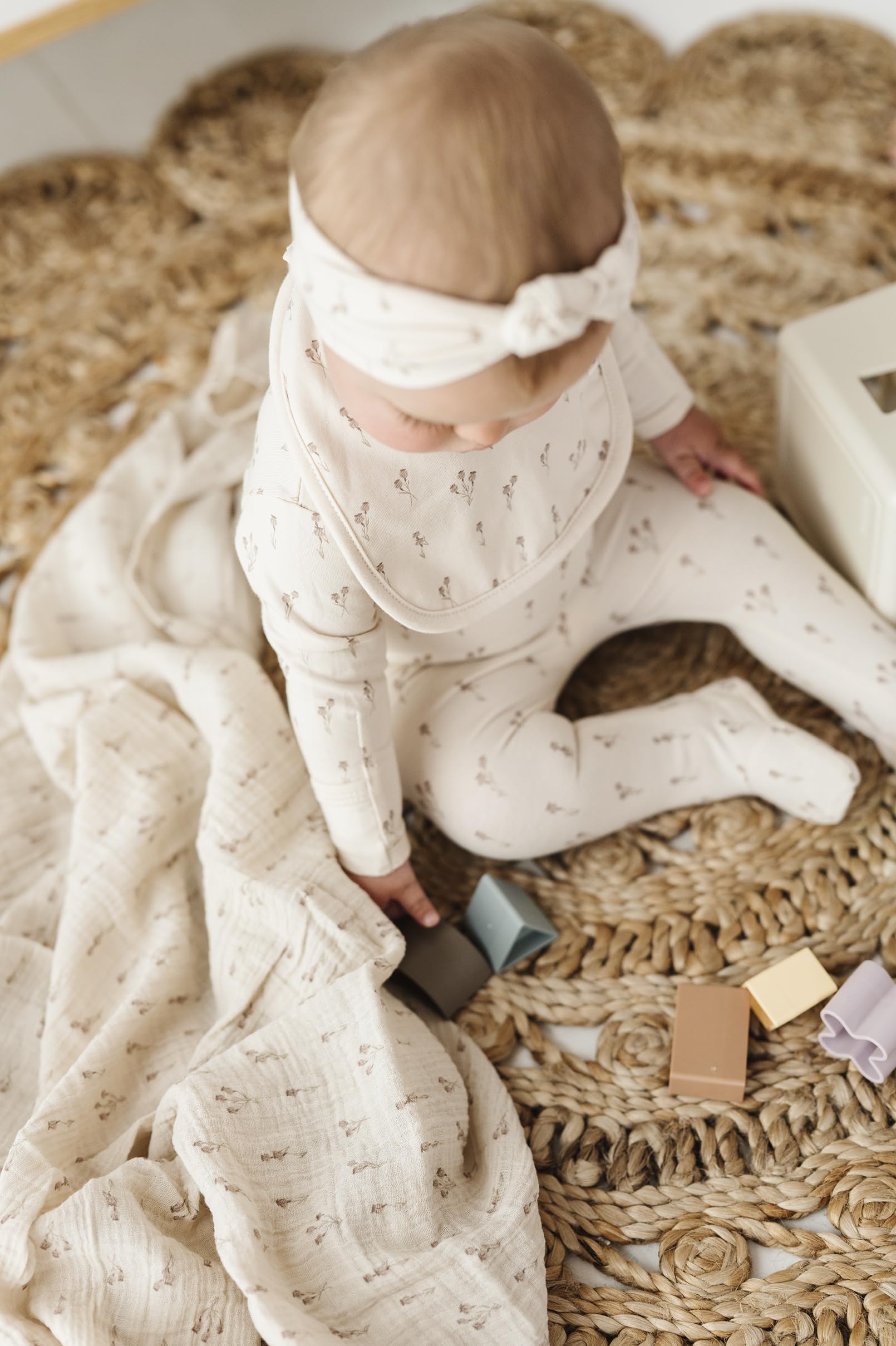 Ely's & Co. packaging shows gift-ready tri-pack set for new parents