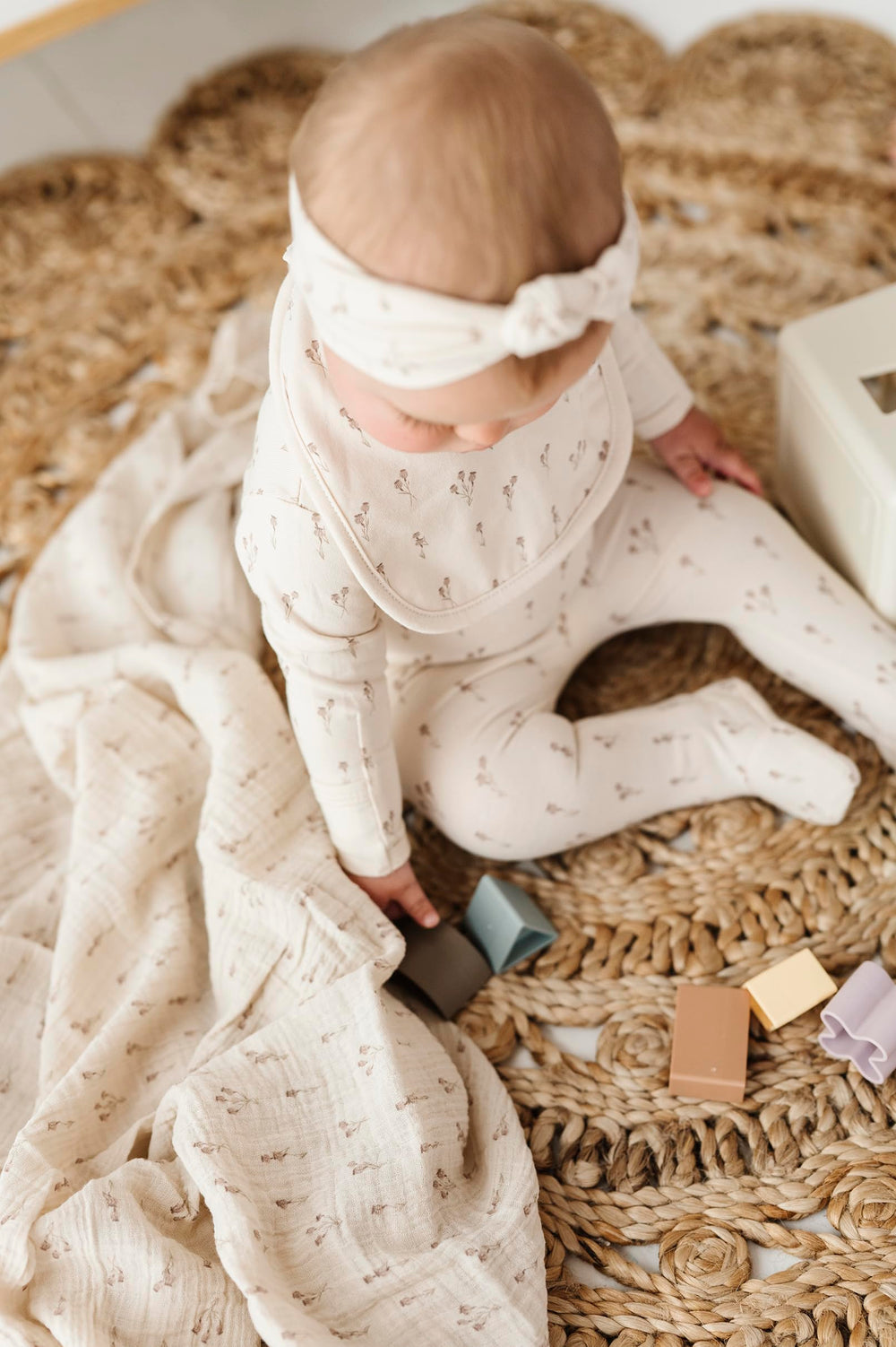 Ely's & Co. packaging shows gift-ready tri-pack set for new parents