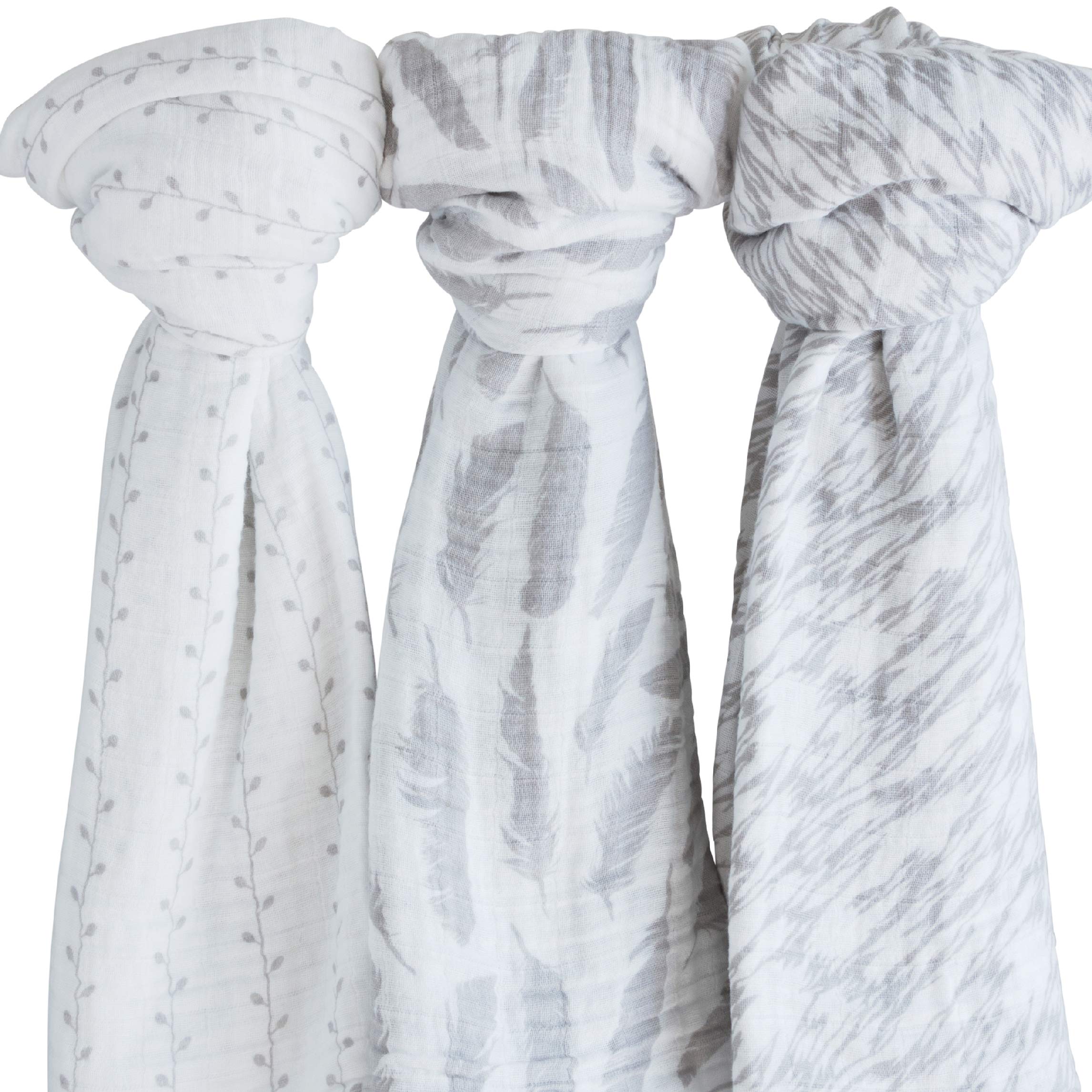 Ely's & Co muslin swaddle demonstrates newborn swaddling in a cozy nursery.